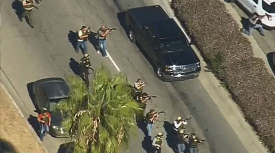 2EFFE73E00000578-3343309-SWAT_teams_swarm_the_center_which_has_670_employees_and_30_000_p-a-16_1449095071088